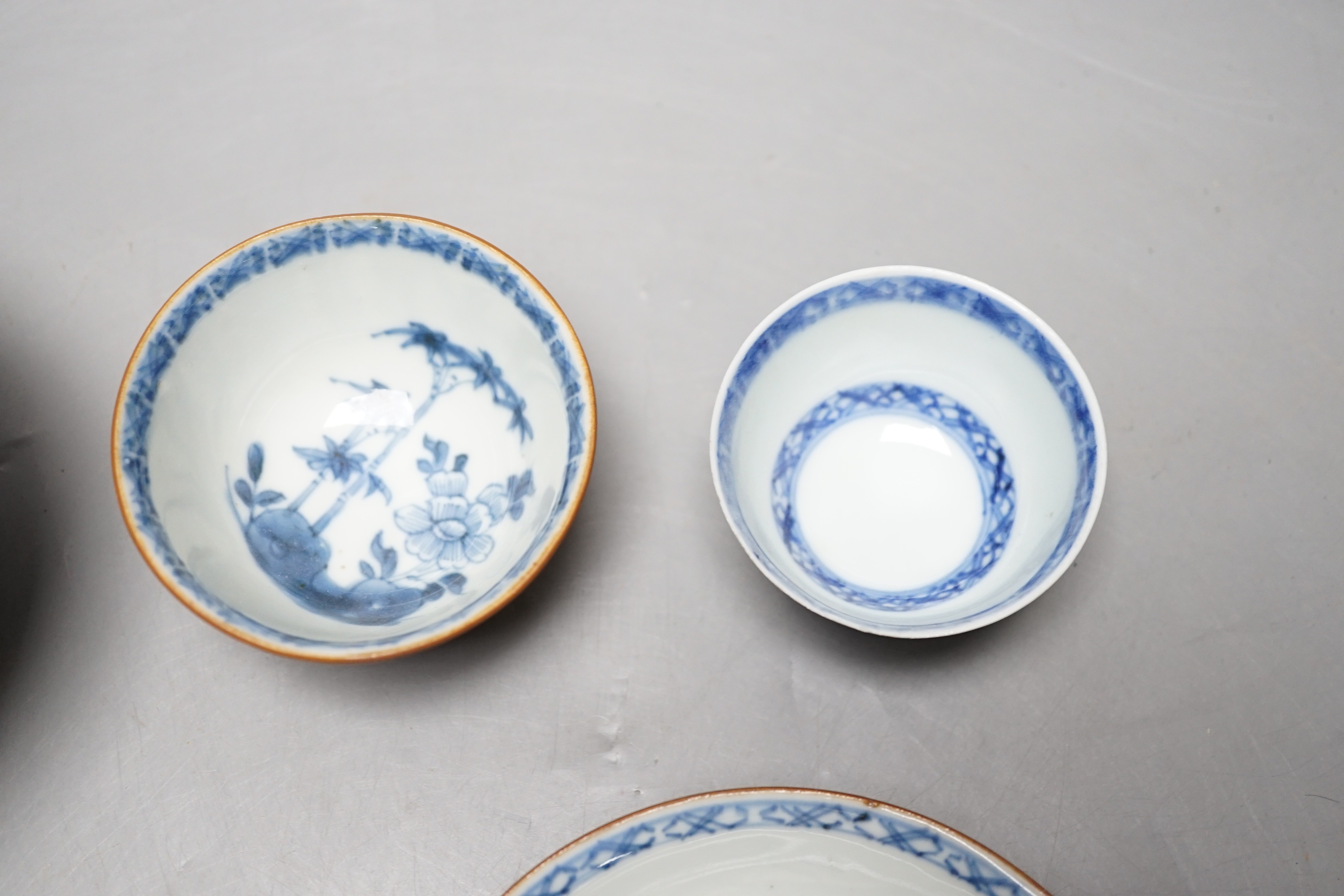 Two Chinese Nanking cargo teabowls and saucers and a Diana cargo sugar bowl, largest 12cm diameter